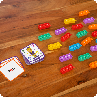 Place the fidget words and card deck in the center