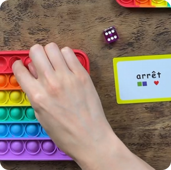 Roll the die & pop the bubbles!